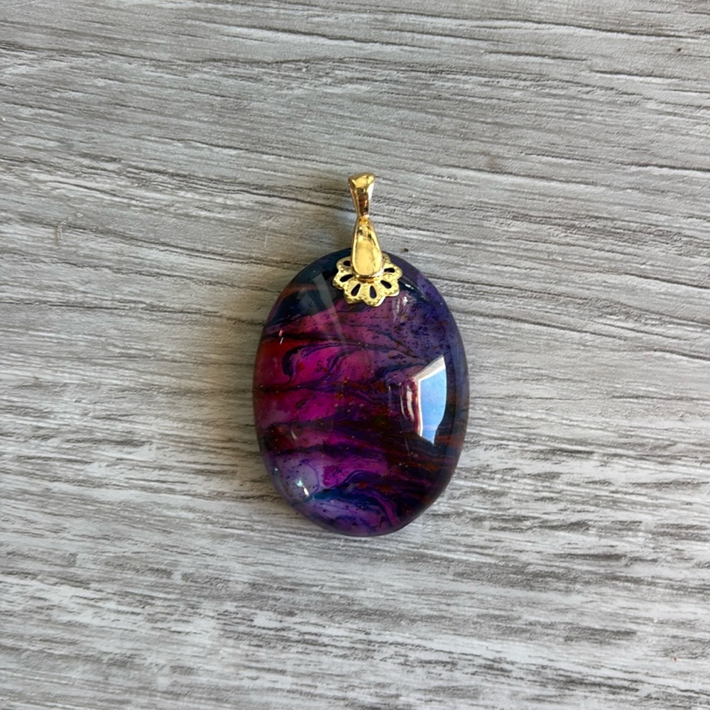 Handcrafted, pink, purple, blue and orange cabochon pendant with gold tone bail